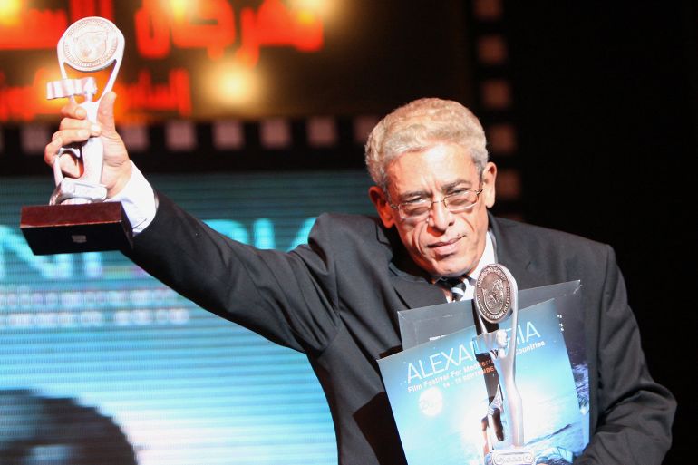 Egyptian director Daoud Abdel Sayed holds two special mention awards for his films "Mowaten we Mokhber we Haramy" (A Citizen, a Spy and a Thief) and "Ard al-Khof" (Land of Fear) during the opening ceremony of the Alexandria Film Festival for Mediterranean Countries in the Egyptian port city of Alexandria, late on September 14, 2010. Thirty five films from 16 countries are showing during the festival from 14-19 September. AFP PHOTO/AMR AHMAD (Photo by AMR AHMAD / AFP)